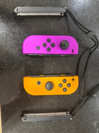 Mandos Joy-Con Morado Neón y Naranja