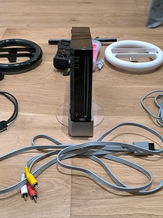 Consola Nintendo Wii con accesorios y 13 juegos