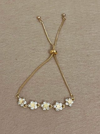 Pulsera Dorada con Flores y Brillantes