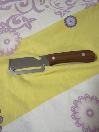 Pelador de patatas zurdo madera y metal