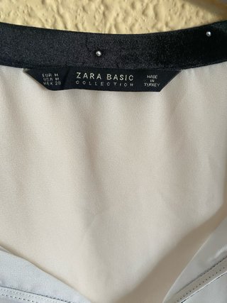 Blusa blanca con detalles negros
