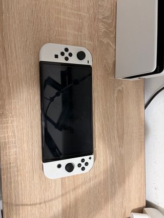 Nintendo Switch OLED Blanca + Mario Kart+Protector