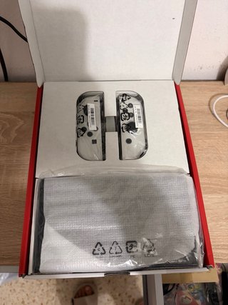 Nintendo Switch OLED Blanca + Mario Kart+Protector