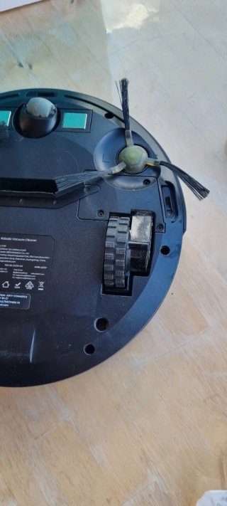 Robot aspirapolvere con base di ricarica