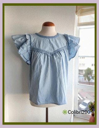 Blusa azul claro con encaje y volantes Salsa