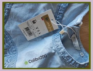Blusa azul claro con encaje y volantes Salsa