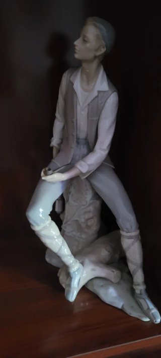 Figura de Porcelana  leñador de lladro
