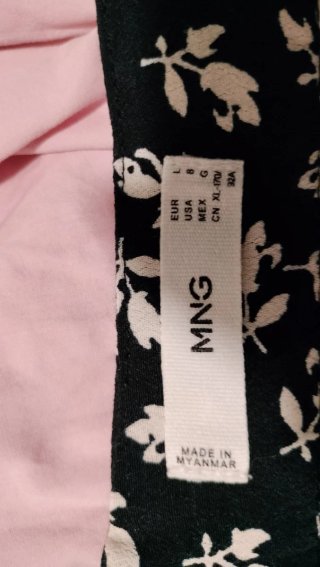 Pantalón Mango negro estampado hojas