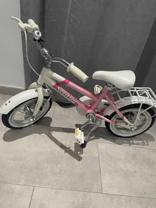 Bicicleta infantil rosa y blanca