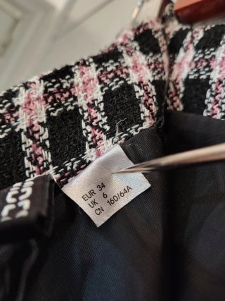 Falda mini tweed cuadros rosa y negro H&M - T 34