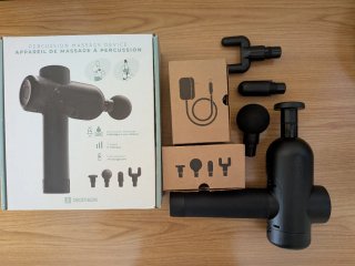 Pistola de masaje