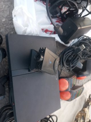 Consola PlayStation 2 (PS2) con accesorios