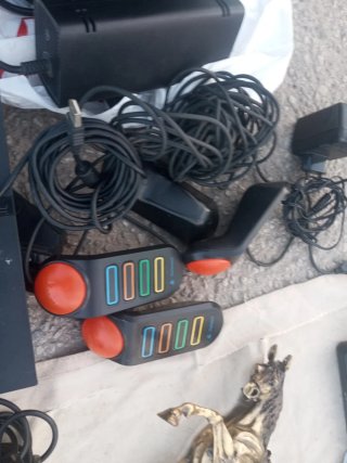 Consola PlayStation 2 (PS2) con accesorios