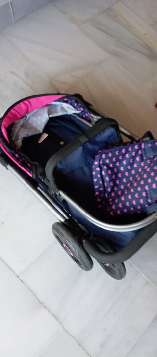 Cochecito bebe  de juguete con unicornio
