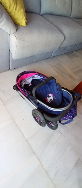Cochecito bebe  de juguete con unicornio
