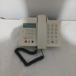 Teléfono fijo de mesa blanco