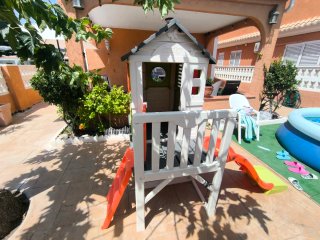 Casita infantil Smoby con tobogán