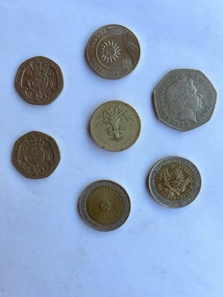 Lote de 7 monedas extranjeras