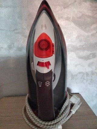 Plancha de ropa como nueva