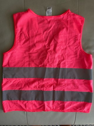 Chaleco reflectante B'Twin rosa,perfecto para bici