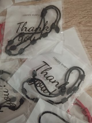 Pulseras 7 nudos (rojo y negro)