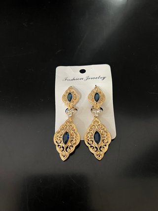 Pendientes árabes dorados con piedra azul