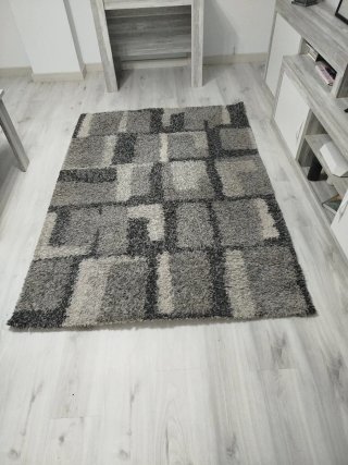 Alfombra pelo gris y negro