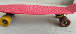 Monopatín rosa penny board