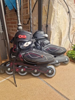 Patines Oxelo negros con ruedas rosas