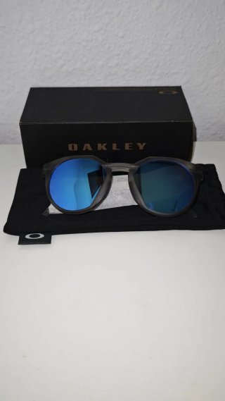 Gafas de sol Oakley grises y azules