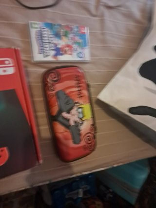 Nintendo Switch Azul/Rojo + Juego Mario Bros