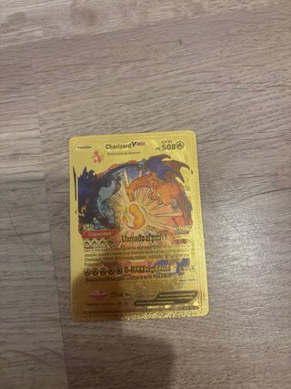 Carta Pokémon Charizard VMAX Dorada