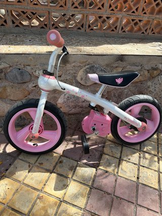Bicicleta infantil rosa y blanca
