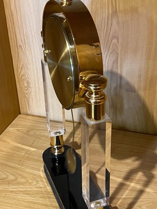 Orologio a pendolo con sfere in cristallo