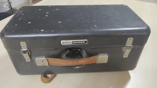 Cámara de fotos con objetivos, lentes y maletín