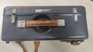 Cámara de fotos con objetivos, lentes y maletín