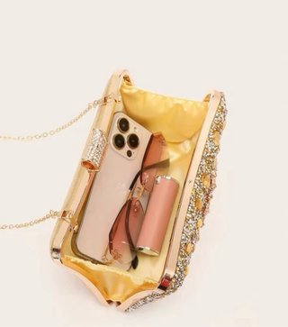 Bolso de fiesta dorado con pedrería