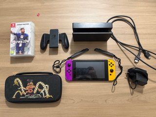 Nintendo Switch + 4 juegos + accesorios