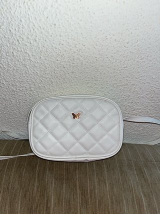 Bolso con decoración dorada