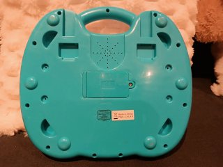Teclado musical infantil con jirafa