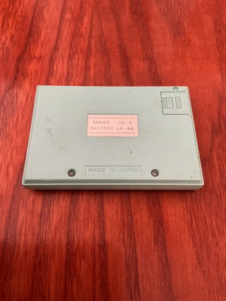 Consola Portátil Vintage PARA REPARAR Q&Q Caveman