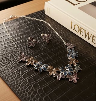 Collar y pendientes flores Zara