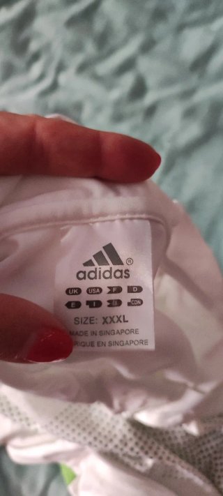 Polo sportivo Adidas bianco