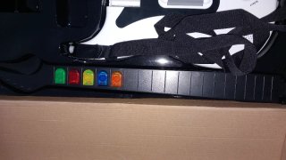 Guitarra Wico con 31 Juegos Plug & Play