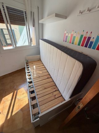 Cama nido blanca con somier de láminas