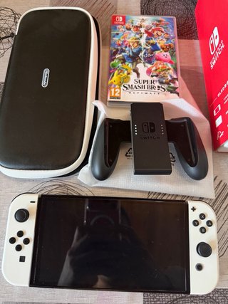 Nintendo Switch OLED Blanca + Juego smash bros
