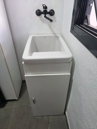 Pila de lavar ROCA con mueble y grifo