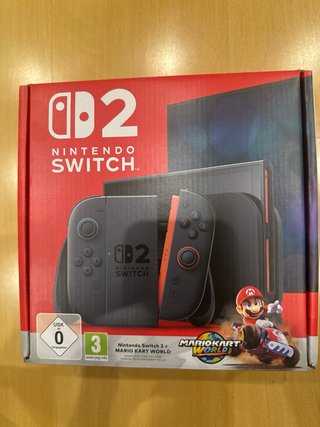 Nintendo Switch 2 + Mario Kart World  (Tennis opc)