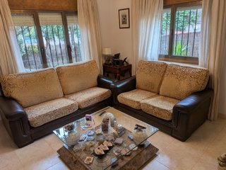 Conjunto de 2 Sofás de cuero y Tela