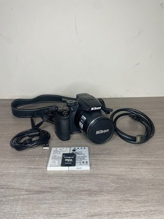 Nikon Coolpix P100 (Pack Completo) - Impecable